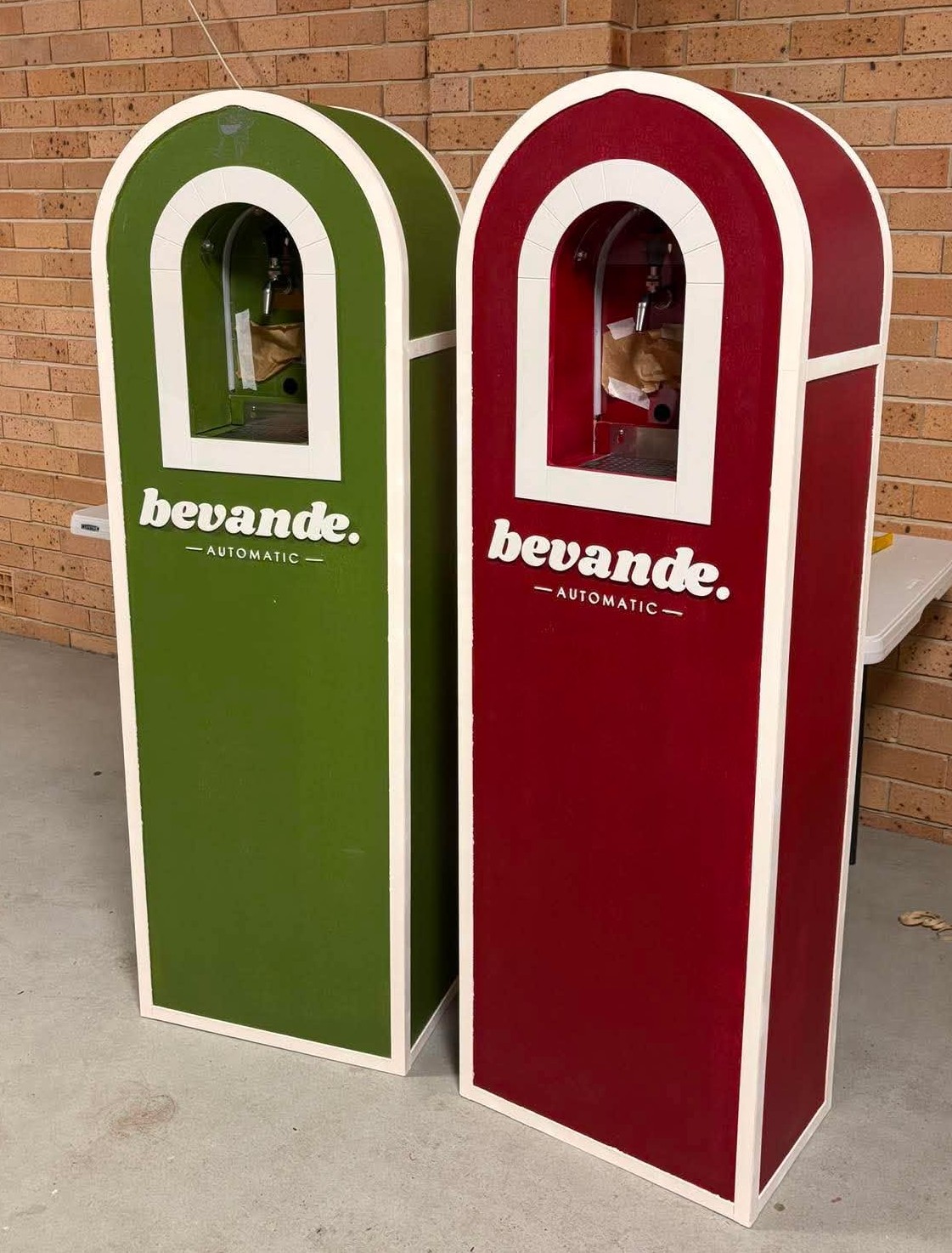 Finished Bevande automatic branded event machines with acrylic lettering installed